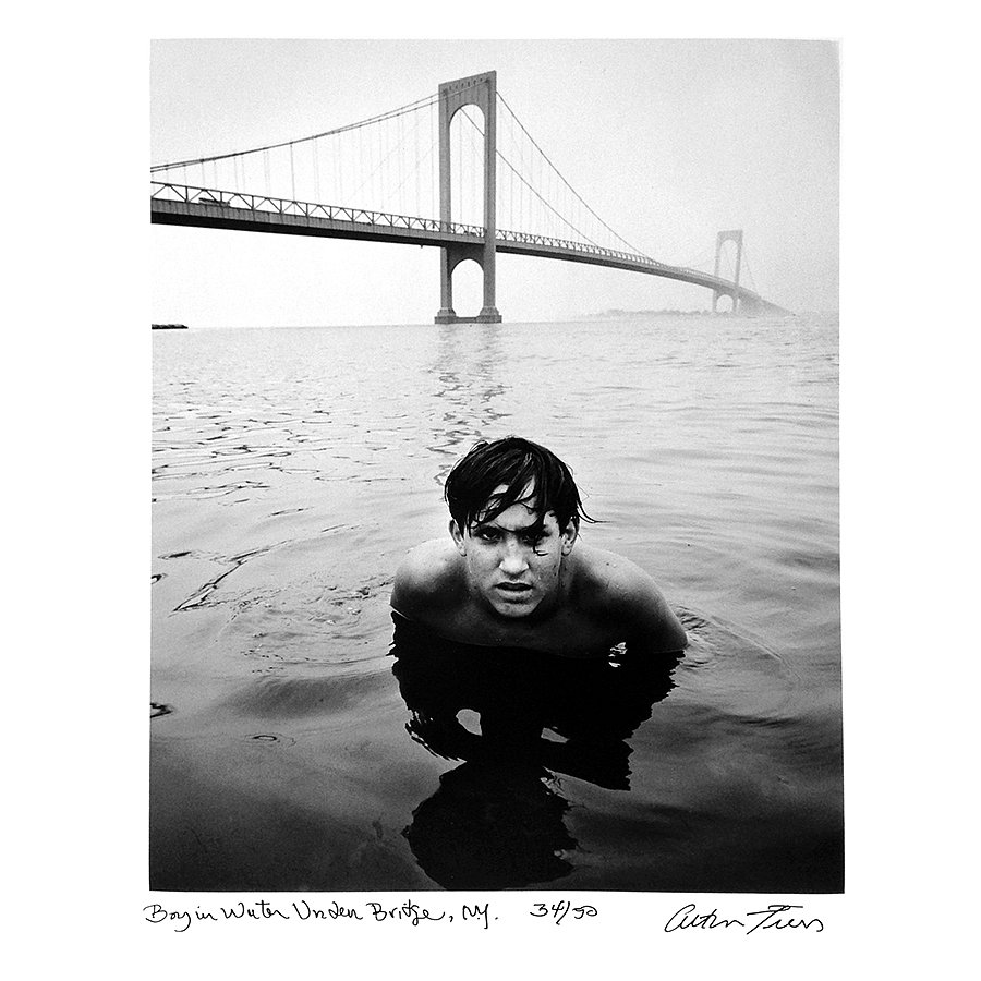 Boy in Water under Bridge